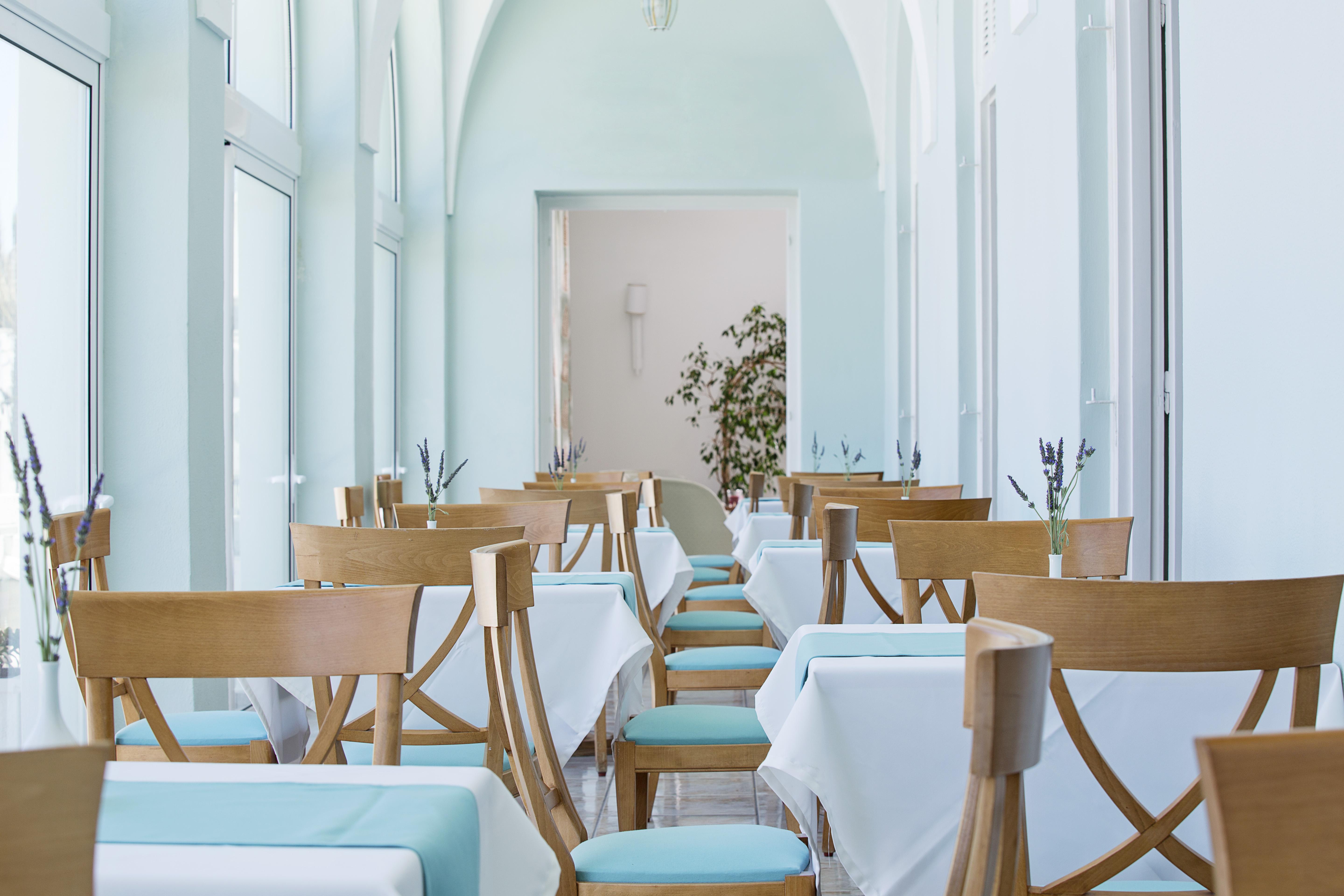 Atlantis Hotel Фіра Ресторан фото